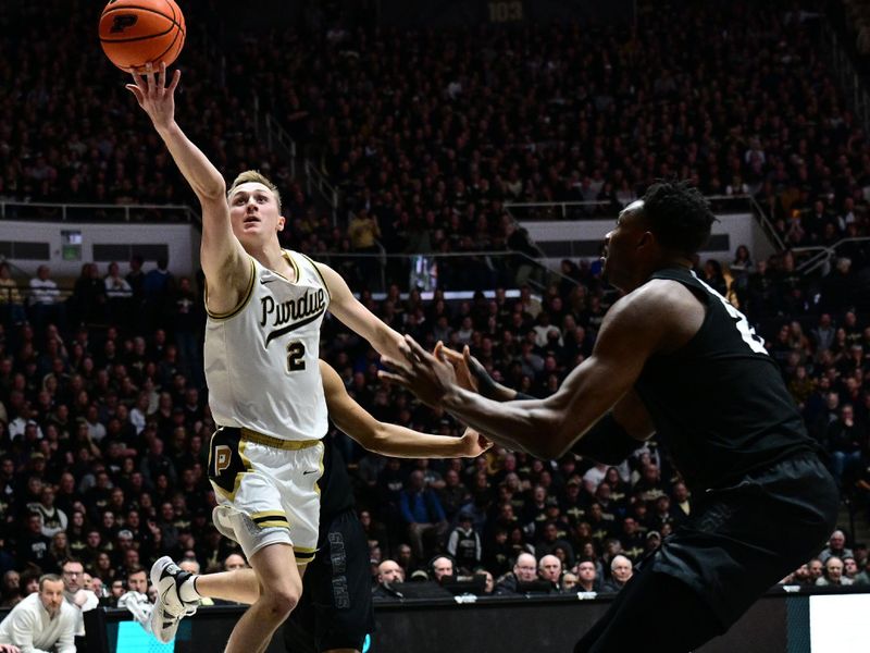 Mar 2, 2024; West Lafayette, Indiana, USA; Purdue Boilermakers guard Fletcher Loyer (2) shoots the ball in front of Michigan State Spartans center Mady Sissoko (22) during the second half at Mackey Arena. Mandatory Credit: Marc Lebryk-USA TODAY Sports