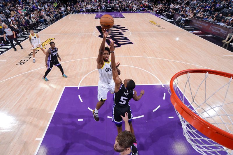 SACRAMENTO, CA - MARCH 31: Colin Sexton #2 of the Utah Jazz drives to the basket during the game against the Sacramento Kings on March 31, 2024 at Golden 1 Center in Sacramento, California. NOTE TO USER: User expressly acknowledges and agrees that, by downloading and or using this Photograph, user is consenting to the terms and conditions of the Getty Images License Agreement. Mandatory Copyright Notice: Copyright 2024 NBAE (Photo by Rocky Widner/NBAE via Getty Images)