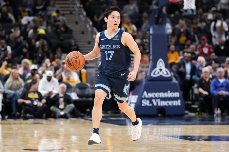 INDIANAPOLIS, INDIANA - OCTOBER 14: Yuki Kawamura #17 of the Memphis Grizzlies dribbles the ball in the fourth quarter against the Indiana Pacers during a preseason game at Gainbridge Fieldhouse on October 14, 2024 in Indianapolis, Indiana. NOTE TO USER: User expressly acknowledges and agrees that, by downloading and or using this photograph, User is consenting to the terms and conditions of the Getty Images License Agreement. (Photo by Dylan Buell/Getty Images)