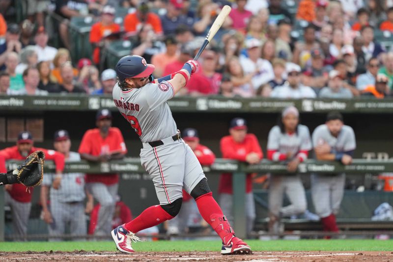 Aug 13, 2024; Baltimore, Maryland, USA; Washington Nationals first baseman Andres Chaparro (19) doubles in the fourth inning for his first major league hit against the Baltimore Orioles at Oriole Park at Camden Yards. Mandatory Credit: Mitch Stringer-USA TODAY Sports