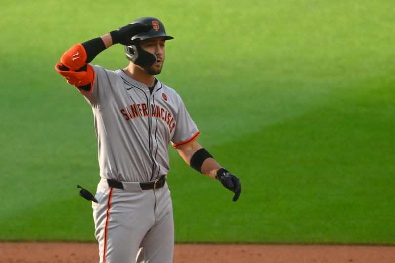 Jul 5, 2024; Cleveland, Ohio, USA; San Francisco Giants left fielder Michael Conforto (8) celebrates his two-RBI double in the first inning against the Cleveland Guardians at Progressive Field. Mandatory Credit: David Richard-USA TODAY Sports