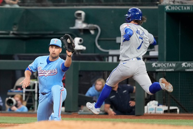 Jun 23, 2024; Arlington, Texas, USA; Texas Rangers first baseman Nathaniel Lowe (30) forces out Kansas City Royals shortstop Bobby Witt Jr. (7) on a ground-out during the seventh inning at Globe Life Field. Mandatory Credit: Jim Cowsert-USA TODAY Sports