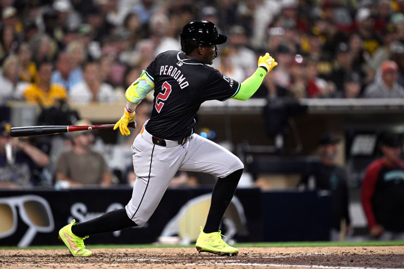 Jul 6, 2024; San Diego, California, USA; Arizona Diamondbacks shortstop Geraldo Perdomo (2) hits an RBI triple against the San Diego Padres during the seventh inning at Petco Park. Mandatory Credit: Orlando Ramirez-USA TODAY Sports