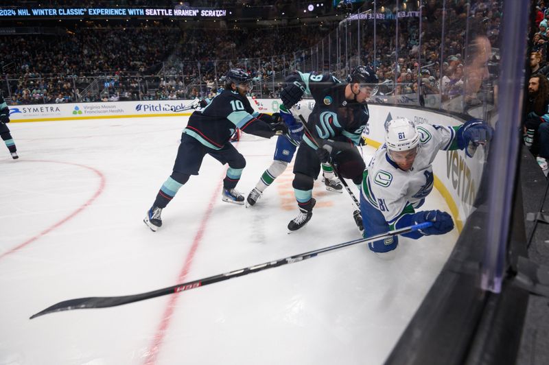 Nov 24, 2023; Seattle, Washington, USA; Seattle Kraken defenseman Vince Dunn (29) trips Vancouver Canucks center Dakota Joshua (81) during the third period at Climate Pledge Arena. Mandatory Credit: Steven Bisig-USA TODAY Sports