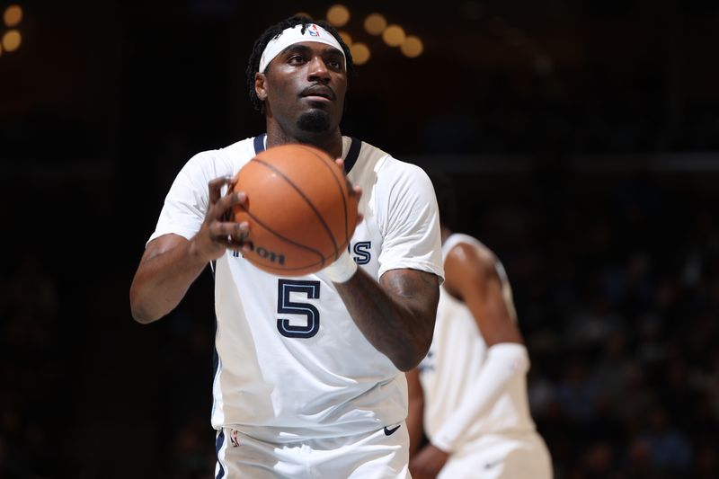 MEMPHIS, TN - FEBRUARY 1: Vince Williams Jr. #5 of the Memphis Grizzlies shoots a free throw during the game against the Cleveland Cavaliers  on February 1, 2024 at FedExForum in Memphis, Tennessee. NOTE TO USER: User expressly acknowledges and agrees that, by downloading and or using this photograph, User is consenting to the terms and conditions of the Getty Images License Agreement. Mandatory Copyright Notice: Copyright 2024 NBAE (Photo by Joe Murphy/NBAE via Getty Images)