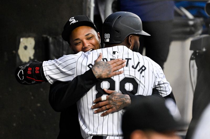 Jun 7, 2024; Chicago, Illinois, USA;  Chicago White Sox outfielder Luis Robert Jr. (88) celebrates with  catcher Martín Maldonado (15) after he hits a home run against the Boston Red Sox during the first inning at Guaranteed Rate Field. Mandatory Credit: Matt Marton-USA TODAY Sports