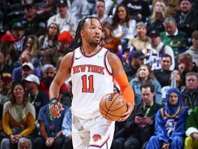 SALT LAKE CITY, UT - DECEMBER 13:  Jalen Brunson #11 of the New York Knicks handles the ball during the game  on December 13, 2023 at vivint.SmartHome Arena in Salt Lake City, Utah. NOTE TO USER: User expressly acknowledges and agrees that, by downloading and or using this Photograph, User is consenting to the terms and conditions of the Getty Images License Agreement. Mandatory Copyright Notice: Copyright 2023 NBAE (Photo by Melissa Majchrzak/NBAE via Getty Images)