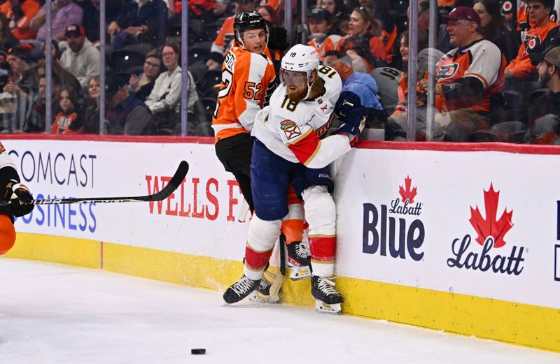 Mar 21, 2023; Philadelphia, Pennsylvania, USA; Florida Panthers defenseman Marc Staal (18) hits Philadelphia Flyers center Tyson Foerster (52) in the first period at Wells Fargo Center. Mandatory Credit: Kyle Ross-USA TODAY Sports