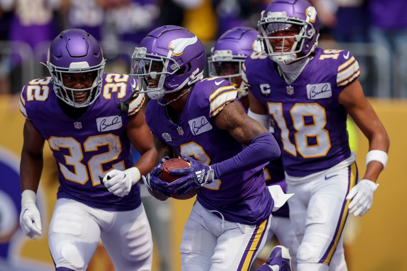 Minnesota Vikings wide receiver Jordan Addison (3) reacts after scoring a touchdown against the Tampa Bay Buccaneers during the first half of an NFL football game Sunday, Sept. 9, 2023 in Minneapolis. (AP Photo/Stacy Bengs)