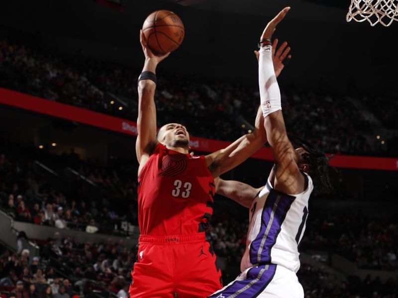 PORTLAND, OR - NOVEMBER 29: Toumani Camara #33 of the Portland Trail Blazers drives to the basket during the game against the Sacramento Kings during the Emirates NBA Cup on November 29, 2024 at the Moda Center Arena in Portland, Oregon. NOTE TO USER: User expressly acknowledges and agrees that, by downloading and or using this photograph, user is consenting to the terms and conditions of the Getty Images License Agreement. Mandatory Copyright Notice: Copyright 2024 NBAE (Photo by Cameron Browne/NBAE via Getty Images)