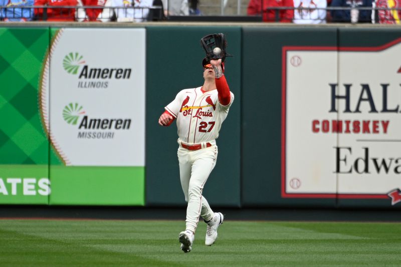 Apr 1, 2023; St. Louis, Missouri, USA; St. Louis Cardinals center fielder Tyler O'Neill (27) catches a fly ball by Toronto Blue Jays center fielder Kevin Kiermaier (not pictured) in the second inning at Busch Stadium. Mandatory Credit: Joe Puetz-USA TODAY Sports