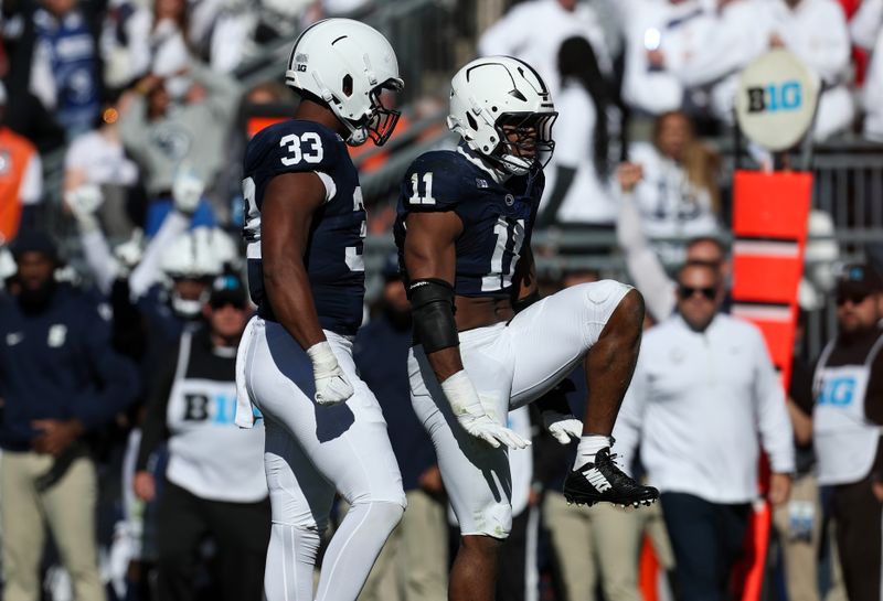 Nov 2, 2024; University Park, Pennsylvania, USA; Penn State Nittany Lions defensive end Abdul Carter (11) reacts after sacking Ohio State Buckeyes quarterback Will Howard (18) (not pictured) during the second quarter at Beaver Stadium. Mandatory Credit: Matthew O'Haren-Imagn Images