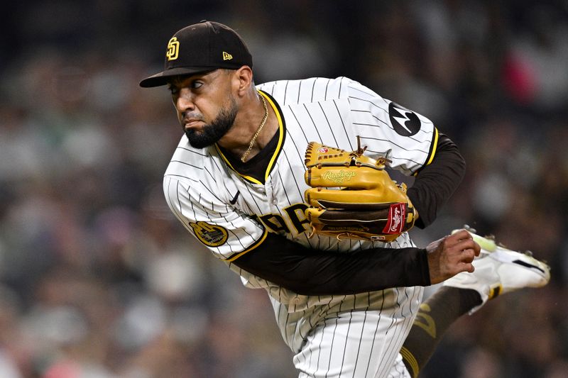 Jun 25, 2024; San Diego, California, USA; San Diego Padres relief pitcher Robert Suarez (75) pitches against the Washington Nationals during the ninth inning at Petco Park. Mandatory Credit: Orlando Ramirez-USA TODAY Sports