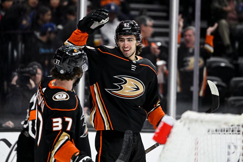 Mar 25, 2023; Anaheim, California, USA; Anaheim Ducks center Nikita Nesterenko (62) celebrates with center Mason McTavish (37) after scoring a goal against the St. Louis Blues during first period at Honda Center. Mandatory Credit: Kelvin Kuo-USA TODAY Sports