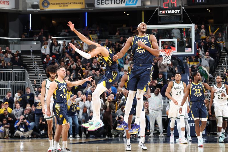 INDIANAPOLIS, IN - JANUARY 3: Tyrese Haliburton #0 and Myles Turner #33 of the Indiana Pacers celebrates during the game against the Milwaukee Bucks on January 3, 2024 at Gainbridge Fieldhouse in Indianapolis, Indiana. NOTE TO USER: User expressly acknowledges and agrees that, by downloading and or using this Photograph, user is consenting to the terms and conditions of the Getty Images License Agreement. Mandatory Copyright Notice: Copyright 2024 NBAE (Photo by Jeff Haynes/NBAE via Getty Images)