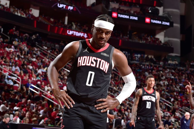 HOUSTON, TX - NOVEMBER 15: Aaron Holiday #0 of the Houston Rockets looks on during the game against the LA Clippers during the Emirates NBA Cup game on November 15, 2024 at the Toyota Center in Houston, Texas. NOTE TO USER: User expressly acknowledges and agrees that, by downloading and or using this photograph, User is consenting to the terms and conditions of the Getty Images License Agreement. Mandatory Copyright Notice: Copyright 2024 NBAE (Photo by Logan Riely/NBAE via Getty Images)