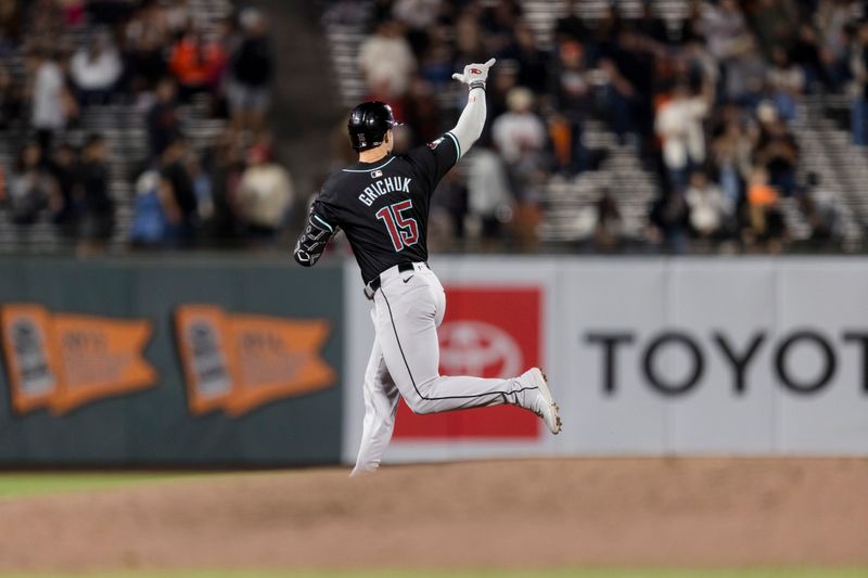 Sep 3, 2024; San Francisco, California, USA;  Arizona Diamondbacks left fielder Randal Grichuk (15) gestures as he runs the bases after he hit a solo home run against the San Francisco Giants during the fifth inning at Oracle Park. Mandatory Credit: John Hefti-Imagn Images