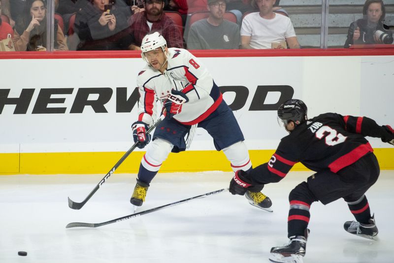 Oct 18, 2023; Ottawa, Ontario, CAN; Washington Capitals left wing Alex Ovechkin (8) shoots the puck past Ottawa Senators defenseman Artem Zub (2) in the third period at the Canadian Tire Centre. Mandatory Credit: Marc DesRosiers-USA TODAY Sports