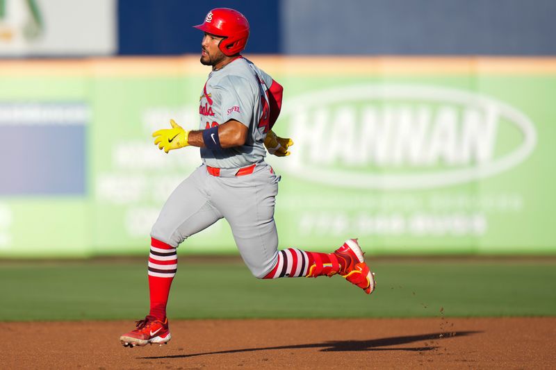 Mar 19, 2024; Port St. Lucie, Florida, USA; St. Louis Cardinals center fielder Ivan Herrera (48) runs second base after hitting a triple against the New York Mets during the second inning at Clover Park. Mandatory Credit: Rich Storry-USA TODAY Sports