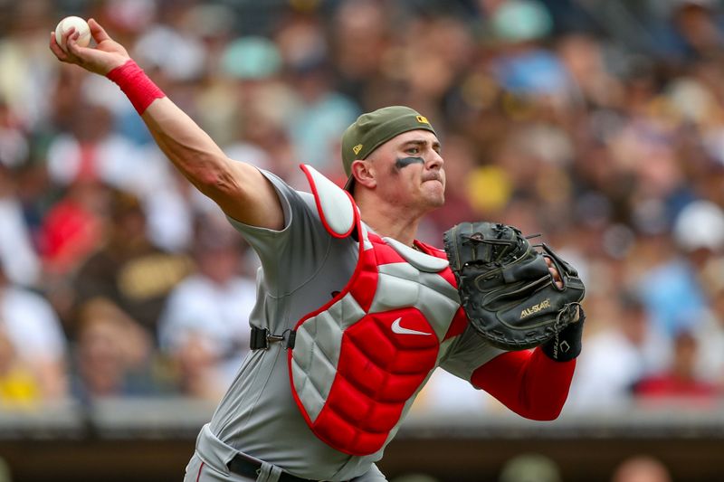 May 21, 2023; San Diego, California, USA; Boston Red Sox catcher Reese McGuire (3) makes the throw to first base in the eighth inning against the San Diego Padres at Petco Park. Mandatory Credit: David Frerker-USA TODAY Sports