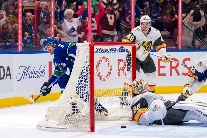 Apr 8, 2024; Vancouver, British Columbia, CAN; Vegas Golden Knights forward Tomas Hertl (48) watches as Vancouver Canucks forward Conor Garland (8) scores on goalie Logan Thompson (36) in the first period  at Rogers Arena. Mandatory Credit: Bob Frid-USA TODAY Sports