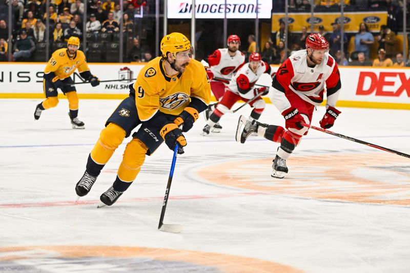 Dec 17, 2025; Nashville, Tennessee, USA; Nashville Predators left wing Filip Forsberg (9) skates with the puck C|  during the second period at Bridgestone Arena. Mandatory Credit: Steve Roberts-Imagn Images
