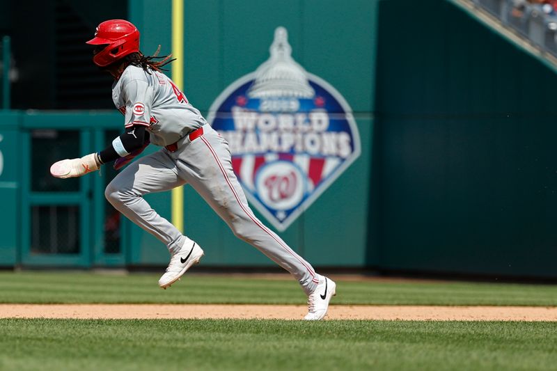 Jul 21, 2024; Washington, District of Columbia, USA; Cincinnati Reds shortstop Elly De La Cruz (44) steals second base against the Washington Nationals during the eighth inning at Nationals Park. Mandatory Credit: Geoff Burke-USA TODAY Sports