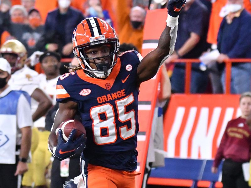 Oct 30, 2021; Syracuse, New York, USA; Syracuse Orange wide receiver Courtney Jackson (85) returns a punt for a touchdown against the Boston College Eagles in the third quarter at the Carrier Dome. Mandatory Credit: Mark Konezny-USA TODAY Sports