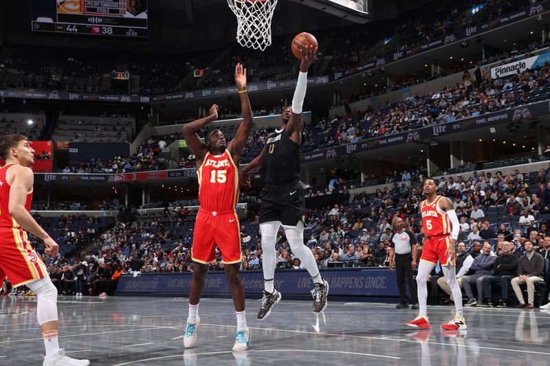 MEMPHIS, TN - MARCH 8: Jaren Jackson Jr. #13 of the Memphis Grizzlies drives to the basket during the game against the Atlanta Hawks on March 8, 2024 at FedExForum in Memphis, Tennessee. NOTE TO USER: User expressly acknowledges and agrees that, by downloading and or using this photograph, User is consenting to the terms and conditions of the Getty Images License Agreement. Mandatory Copyright Notice: Copyright 2024 NBAE (Photo by Joe Murphy/NBAE via Getty Images)