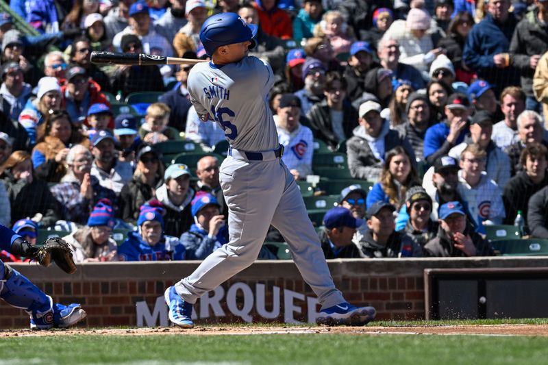 Apr 5, 2024; Chicago, Illinois, USA;  Los Angeles Dodgers catcher Will Smith (16) hits a single against the Chicago Cubs during the first inning at Wrigley Field. Mandatory Credit: Matt Marton-USA TODAY Sports