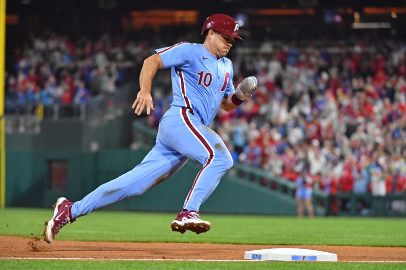 Apr 11, 2024; Philadelphia, Pennsylvania, USA; Philadelphia Phillies catcher J.T. Realmuto (10) rounds third base against the Pittsburgh Pirates during the seventh inning at Citizens Bank Park. Mandatory Credit: Eric Hartline-USA TODAY Sports