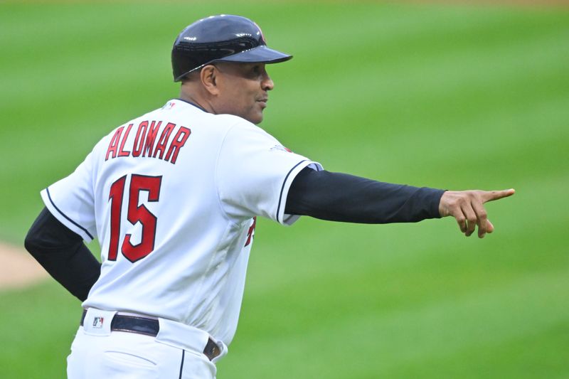 Jun 8, 2023; Cleveland, Ohio, USA; Cleveland Guardians first base coach Sandy Alomar Jr. (15) runs on the field in the first inning against the Boston Red Sox at Progressive Field. Mandatory Credit: David Richard-USA TODAY Sports