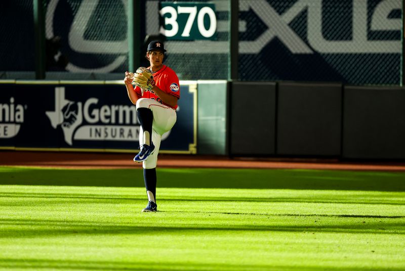 Jun 21, 2024; Houston, Texas, USA; Houston Astros starting pitcher Jake Bloss (39) warms up before pitching against the Baltimore Orioles at Minute Maid Park. This is Bloss major league debut. Mandatory Credit: Thomas Shea-USA TODAY Sports