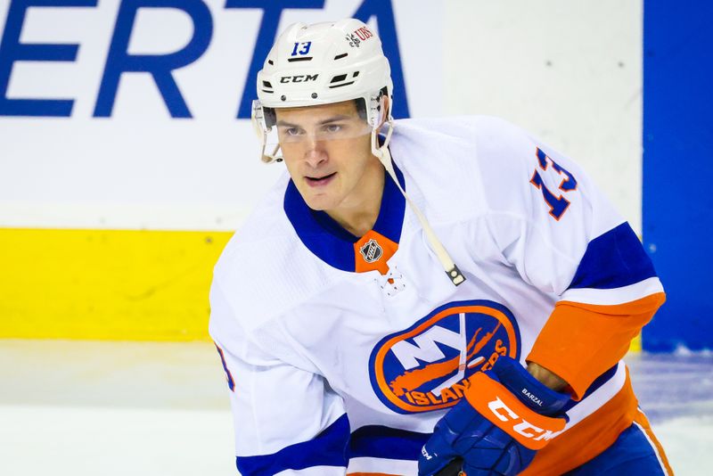 Nov 18, 2023; Calgary, Alberta, CAN; New York Islanders center Mathew Barzal (13) skates during the warmup period against the Calgary Flames at Scotiabank Saddledome. Mandatory Credit: Sergei Belski-USA TODAY Sports