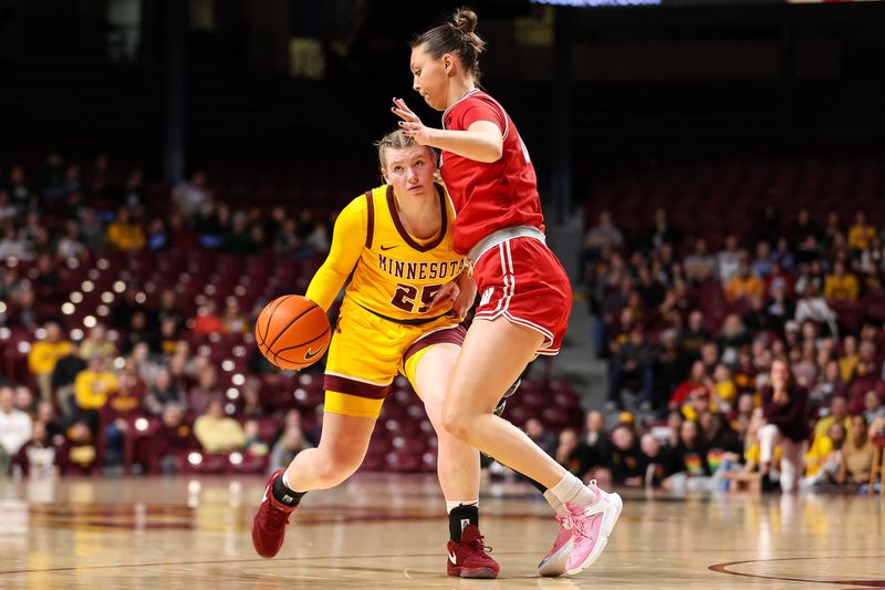 Feb 20, 2024; Minneapolis, Minnesota, USA; Minnesota Golden Gophers guard Grace Grocholski (25) dribbles as Wisconsin Badgers guard Halle Douglass (10) defends during the first half at Williams Arena. Mandatory Credit: Matt Krohn-USA TODAY Sports