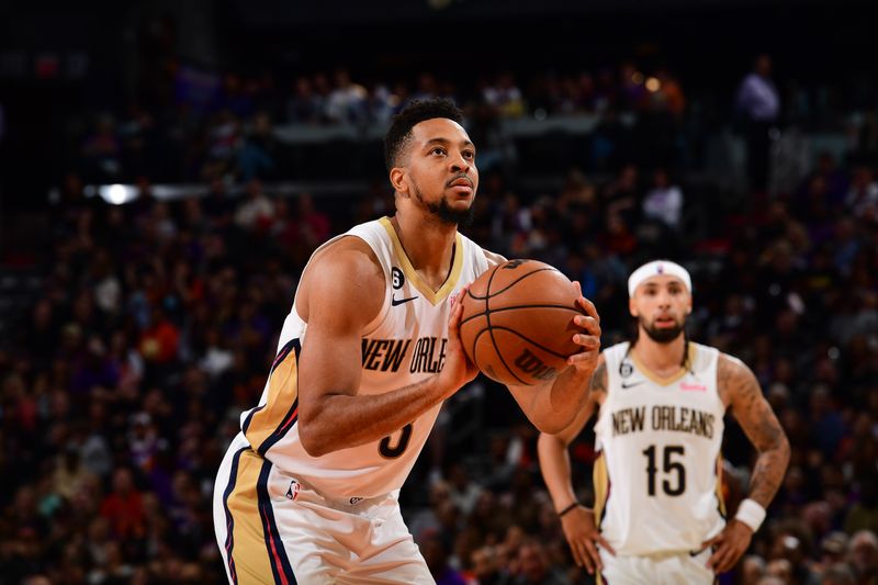 PHOENIX, AZ - OCTOBER 28: CJ McCollum #3 of the New Orleans Pelicans shoots a free throw during the game before the game against the Phoenix Suns on October 28, 2022 at Footprint Center in Phoenix, Arizona. NOTE TO USER: User expressly acknowledges and agrees that, by downloading and or using this photograph, user is consenting to the terms and conditions of the Getty Images License Agreement. Mandatory Copyright Notice: Copyright 2022 NBAE (Photo by Kate Frese/NBAE via Getty Images)