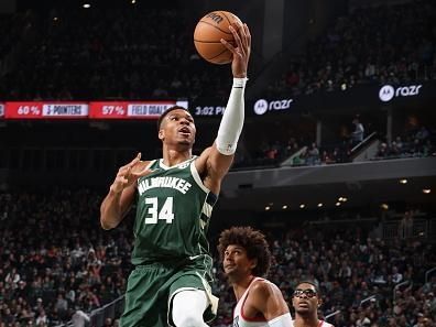 MILWAUKEE, WI - NOVEMBER 26: Giannis Antetokounmpo #34 of the Milwaukee Bucks drives to the basket during the game against the Portland Trail Blazers on November 26, 2023 at the Fiserv Forum Center in Milwaukee, Wisconsin. NOTE TO USER: User expressly acknowledges and agrees that, by downloading and or using this Photograph, user is consenting to the terms and conditions of the Getty Images License Agreement. Mandatory Copyright Notice: Copyright 2023 NBAE (Photo by Jeff Haynes/NBAE via Getty Images).