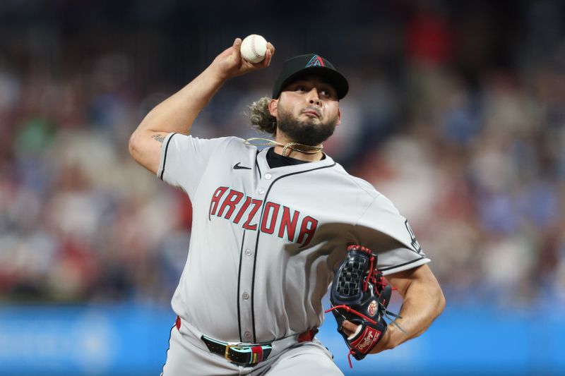 May 2, 2025; Philadelphia, Pennsylvania, USA; Arizona Diamondbacks pitcher Juan Morillo (67) throws a pitch during the sixth inning against the Philadelphia Phillies at Citizens Bank Park. Mandatory Credit: Bill Streicher-Imagn Images