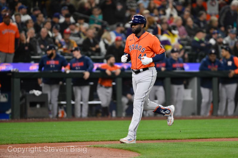 Sep 27, 2023; Seattle, Washington, USA; Houston Astros designated hitter Yordan Alvarez (44) jogs towards home plate after hitting a home run against the Seattle Mariners during the fourth inning at T-Mobile Park. Mandatory Credit: Steven Bisig-USA TODAY Sports