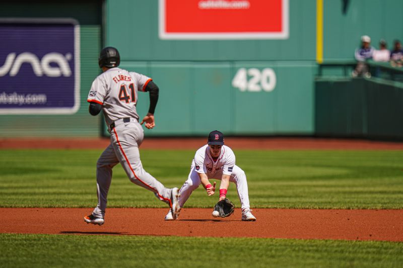 May 2, 2024; Boston, Massachusetts, USA; Boston Red Sox second baseman Zack Short (18) makes the play against the San Francisco Giants in the first inning at Fenway Park. Mandatory Credit: David Butler II-USA TODAY Sports