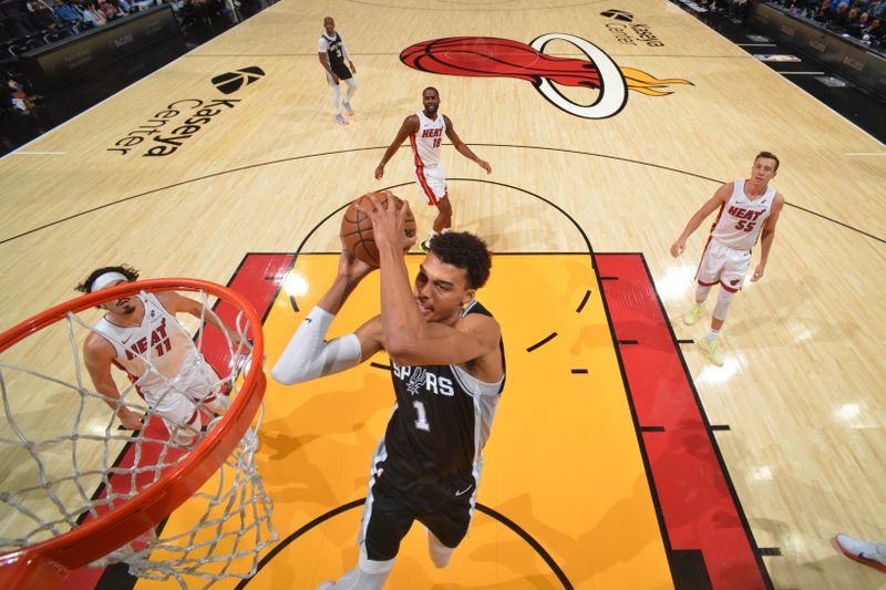 MIAMI, FL - OCTOBER 15: Victor Wembanyama #1 of the San Antonio Spurs dunks the ball during the game against the Miami Heat during a NBA preseason game on October 15, 2024 at Kaseya Center in Miami, Florida. NOTE TO USER: User expressly acknowledges and agrees that, by downloading and or using this Photograph, user is consenting to the terms and conditions of the Getty Images License Agreement. Mandatory Copyright Notice: Copyright 2024 NBAE (Photo by Jesse D. Garrabrant/NBAE via Getty Images)