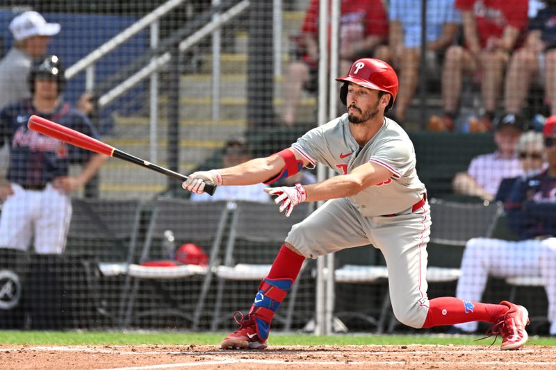 Mar 3, 2024; North Port, Florida, USA; Philadelphia Phillies catcher Garrett Stubbs (21) swings at a pitch in the third inning of the spring training game against the Atlanta Braves at CoolToday Park. Mandatory Credit: Jonathan Dyer-USA TODAY Sports