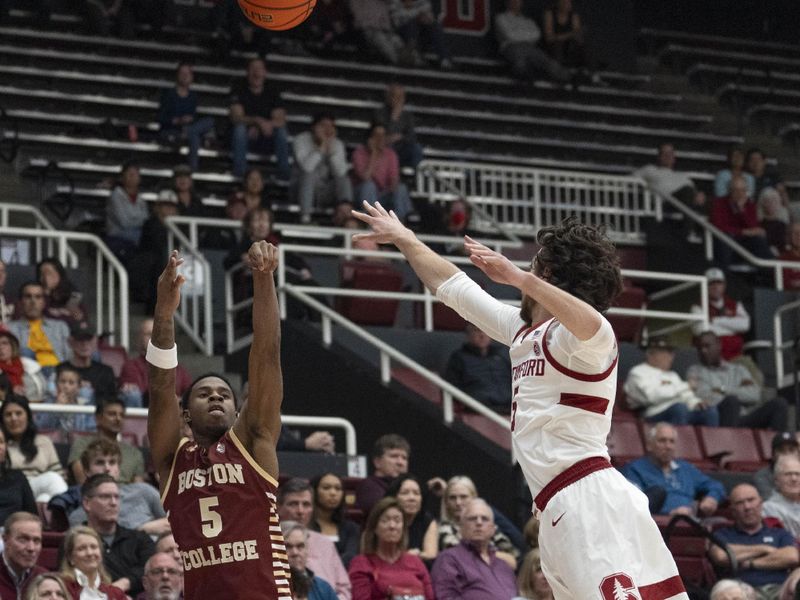 Feb 26, 2025; Stanford, California, USA;  Boston College Eagles guard Fred Payne (5) shoots the ball during the second half against Stanford Cardinal guard Benny Gealer (5) at Maples Pavilion. Mandatory Credit: Stan Szeto-Imagn Images