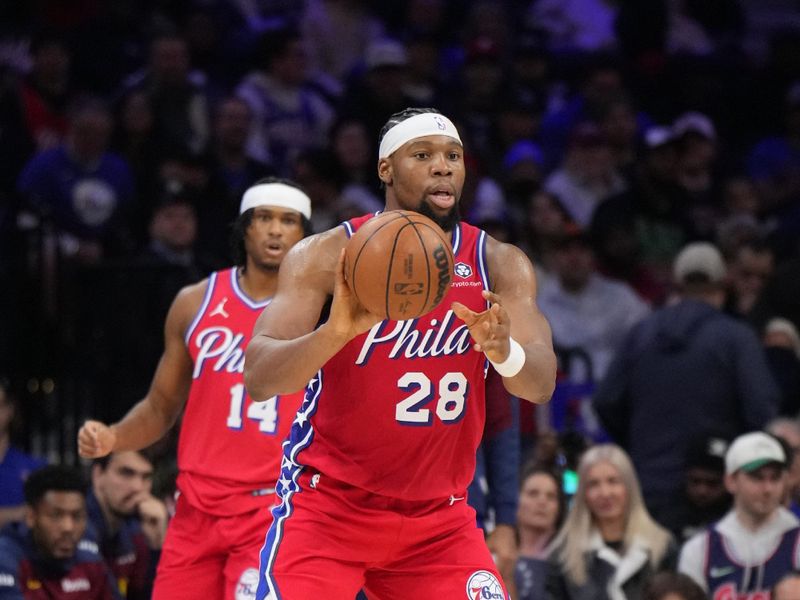 PHILADELPHIA, PA - JANUARY 31: Guerschon Yabusele #28 of the Philadelphia 76ers passes the ball during the game against the Denver Nuggets on January 31, 2025 at the Wells Fargo Center in Philadelphia, Pennsylvania NOTE TO USER: User expressly acknowledges and agrees that, by downloading and/or using this Photograph, user is consenting to the terms and conditions of the Getty Images License Agreement. Mandatory Copyright Notice: Copyright 2025 NBAE (Photo by Jesse D. Garrabrant/NBAE via Getty Images)