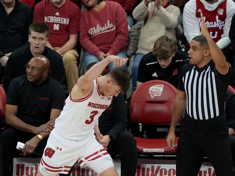 Jan 6, 2024; Madison, Wisconsin, USA; Wisconsin guard Connor Essegian (3) reacts after making a three-point basket during the first half at Kohl Center. Mandatory Credit: Mark Hoffman-USA TODAY Sports