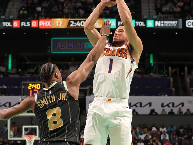 CHARLOTTE, NC - MARCH 1:  Devin Booker #1 of the Phoenix Suns shoots the ball against the Charlotte Hornets on March 1, 2023 at Spectrum Center in Charlotte, North Carolina. NOTE TO USER: User expressly acknowledges and agrees that, by downloading and or using this photograph, User is consenting to the terms and conditions of the Getty Images License Agreement. Mandatory Copyright Notice: Copyright 2023 NBAE (Photo by Kent Smith/NBAE via Getty Images)