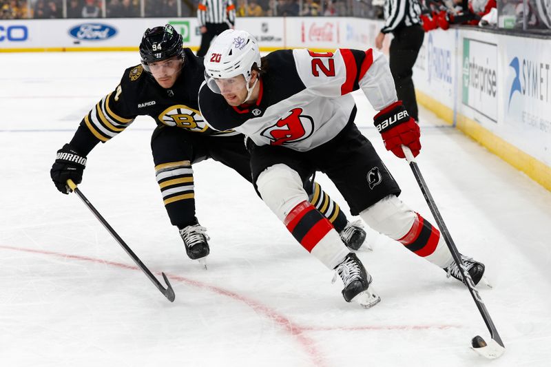 Jan 15, 2024; Boston, Massachusetts, USA; New Jersey Devils center Michael McLeod (20) tries to hold off Boston Bruins center Jakub Lauko (94) during the second period at TD Garden. Mandatory Credit: Winslow Townson-USA TODAY Sports