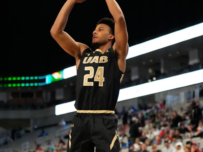 Mar 16, 2024; Fort Worth, TX, USA;  UAB Blazers guard Efrem Johnson (24) scores a three point basket against the South Florida Bulls during the second half at Dickies Arena. Mandatory Credit: Chris Jones-USA TODAY Sports