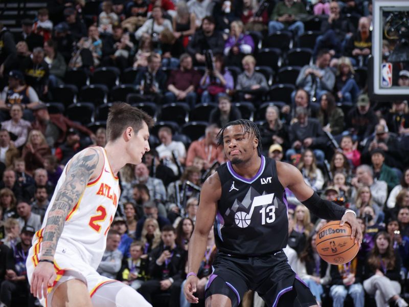 SALT LAKE CITY, UT - JANUARY 7: Isaiah Collier #13 of the Utah Jazz dribbles the ball during the game against the Atlanta Hawks on January 7, 2025 at Delta Center in Salt Lake City, Utah. NOTE TO USER: User expressly acknowledges and agrees that, by downloading and or using this Photograph, User is consenting to the terms and conditions of the Getty Images License Agreement. Mandatory Copyright Notice: Copyright 2025 NBAE (Photo by Melissa Majchrzak/NBAE via Getty Images)