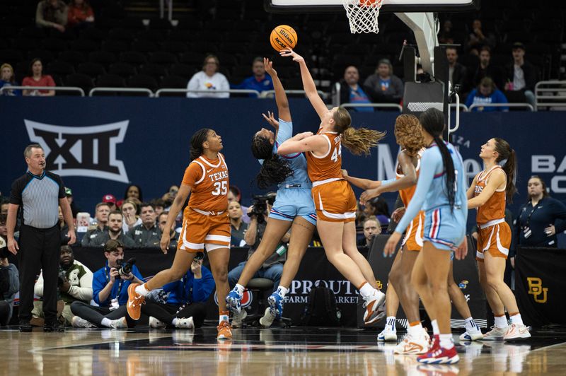 Mar 9, 2024; Kansas City, MO, USA; Kansas Jayhawks guard S'Mya Nichols (12) shoots the ball against Texas Longhorns forward Taylor Jones (44) during the second half at T-Mobile Center. Mandatory Credit: Amy Kontras-USA TODAY Sports